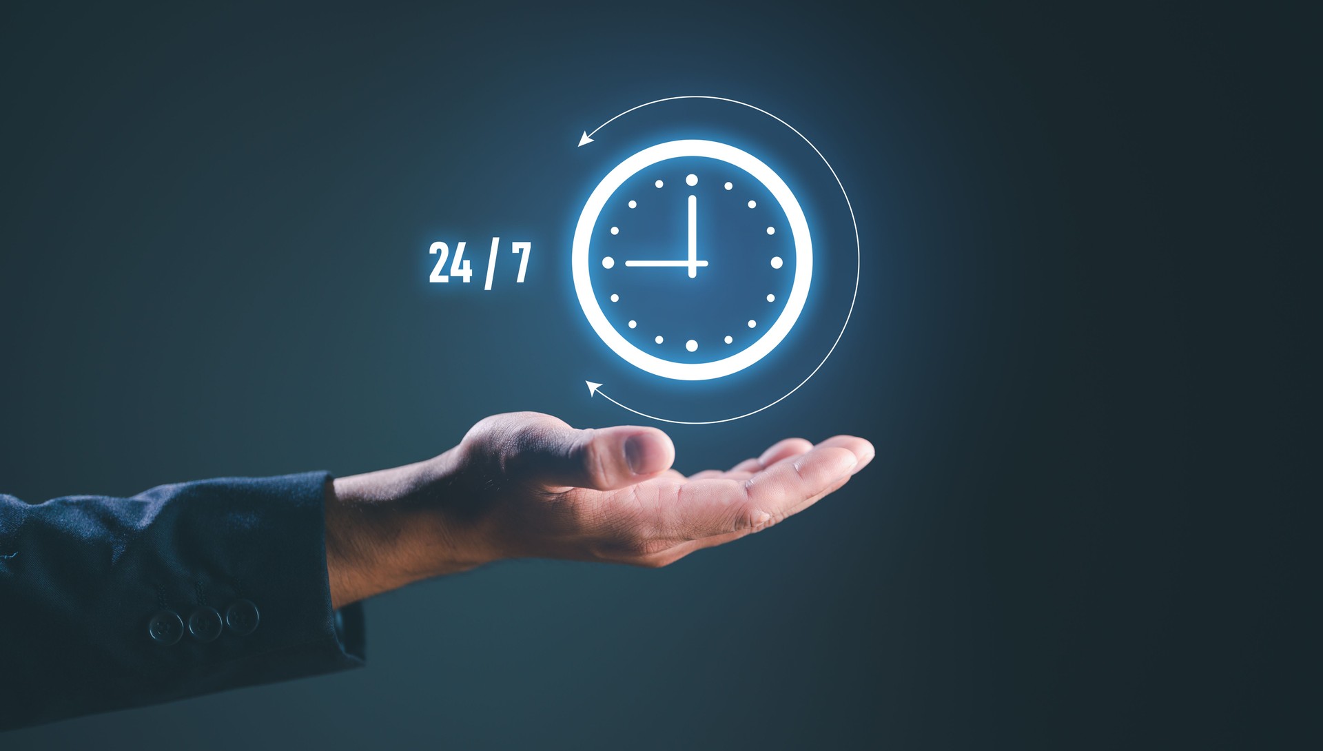nonstop service concept. businessman hand holding virtual 24/7 with clock on hand for worldwide nonstop and full-time available contact of service concept. customer service.